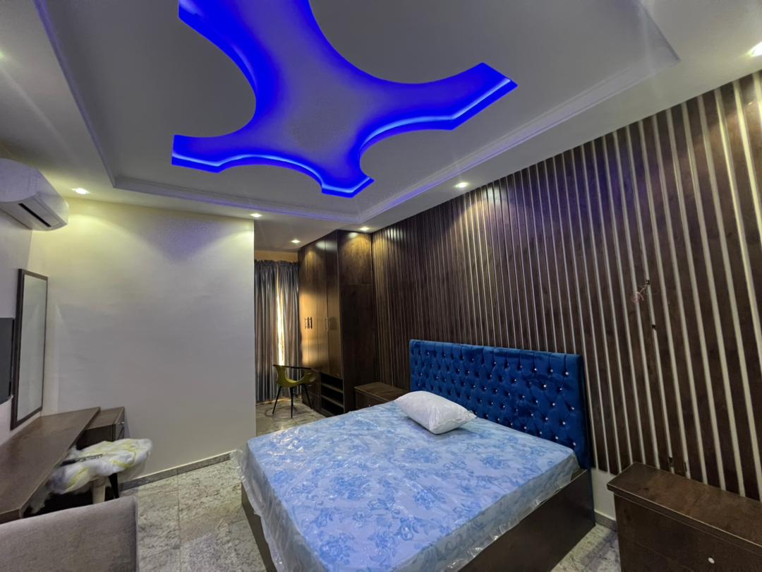 Alternative angle of the Executive Room showing the fitted wardrobe and ceiling feature lighting