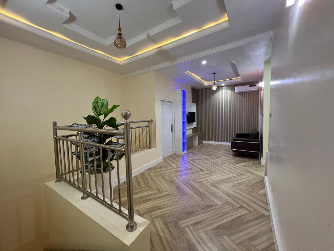 Shared upper landing and sitting area of the Aston shared residence in Apo Legislative Quarters